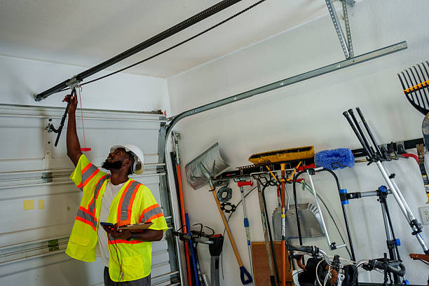 Professional Garage Door Installation technician working in South Burlington, VT